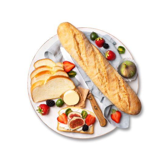 A plate with a baguette and other French dishes